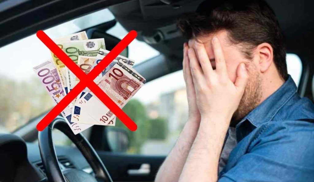 Uomo disperato in auto (Depositphotos foto) - www.managementcue.it