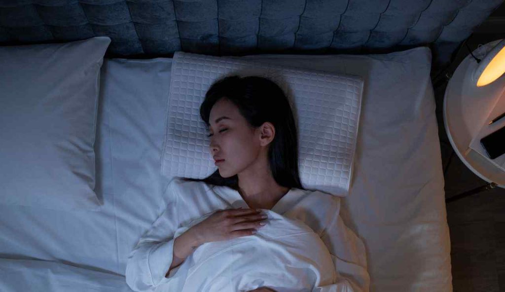 Donna malata a letto